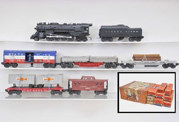 Boxed Lionel Set 2289WS: Circa 1957. 736 Berkshire loco, white lettering, nice matte patina; 2046W tender, matches engine nicely; 6430 flat with Cooper-Jarrett vans; 3494-275 SOM operating boxcar; 3359-55 double dump car, wit