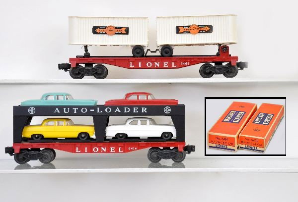 Boxed Lionel Freight Cars: 6414 auto loader, turquoise car has broken rear bumper;6430 flat with Cooper-Jarrett vans; Nice original boxes. Cars otherwise show light to moderate playwear, C7