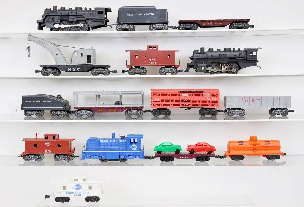 Boxed Marx Sets: 14960 includes 490 loco, tender, flat no rails, wrecker, caboose, knuckle couplers, track; Set 48-21325M includes 490 loco with sound, slope back tender, auto loader (no cars), gondola, operating stoc
