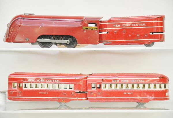 Marx Red Mercury Set: Mercury loco, electric, NYC tender, Chicago coach, Detroit observation, small dent on roof. Otherwise, clean and shiny showing moderate playwear, C6