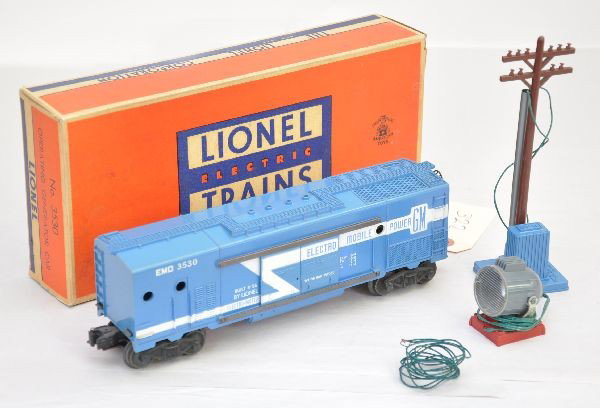 Boxed Lionel 3530 Generator Car: Toughest example with long stripe, blue tanks and blue base pole, crisp original box. Car shows light playwear, C8