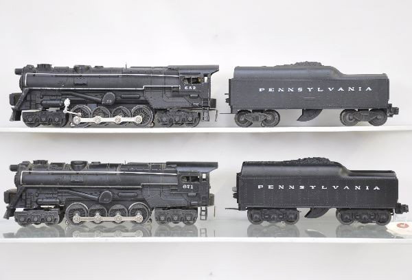 Lionel Steam Turbines: 671 nose decal 100%, 2671W Penn tender, 682 turbine, nose decal is 95%, stripe is 60%, 2046T-50 Penn tender. Otherwise, shows light to moderate playwear, C6-7