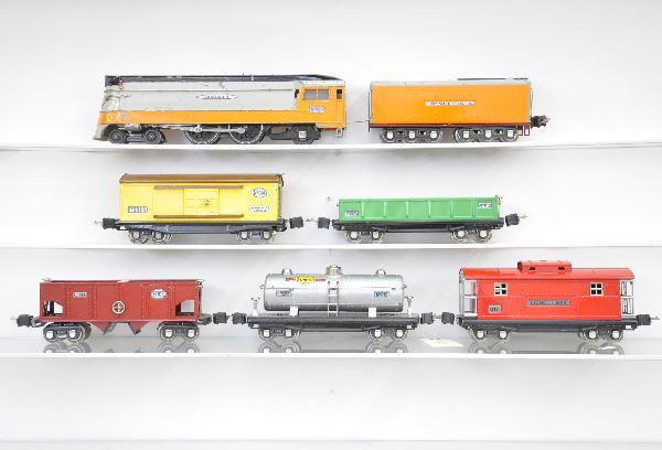 Lionel Hiawatha Freight Set: Pre-War. Circa 1935, 250E Streamline loco, wheels turn freely (C6-); 250W whistling tender (C6-); 812 gondola; 814 boxcar; 815 Sunoco tank car; 816 blood red hopper; 817 caboose. All have manual box c