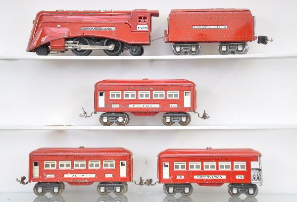 Lionel Red Comet Train Set: Pre-War. Circa 1936, 264E Commodore Vanderbilt loco, replaced cab and wheels; 265W tender; 2 #603 Pullmans; 604 observation. Set is clean and shiny but shows moderate to heavy playwear, C5-6