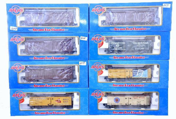 Boxed Atlas Freight Cars: Reefers include: 8022-2 Clicquot Club, 8024-1 Pearl Brand, 8023-2 Page Milk, 8025-1 Peter Fox Beer. Boxcars include: 8307-2 B&M, 8307-1 -4 B&M boxcars. All are unrun with original boxes and inserts, C