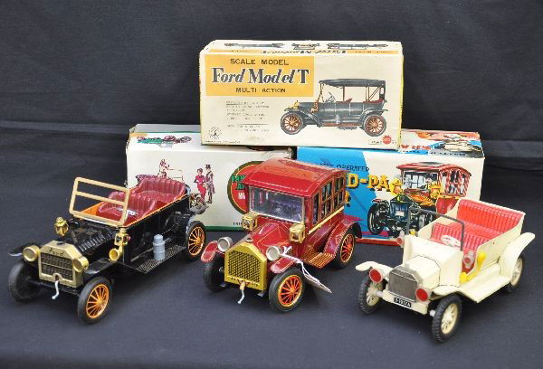 Boxed Old Fashioned Battery Vehicles: Largest is 10" long. Includes Sunrise Ford Model T with removable top (not in photo) with smoke and insert; TN Japan Ford Model T tourer, friction; Yone Japan Grand-Pa Car, with smoke. All have origin