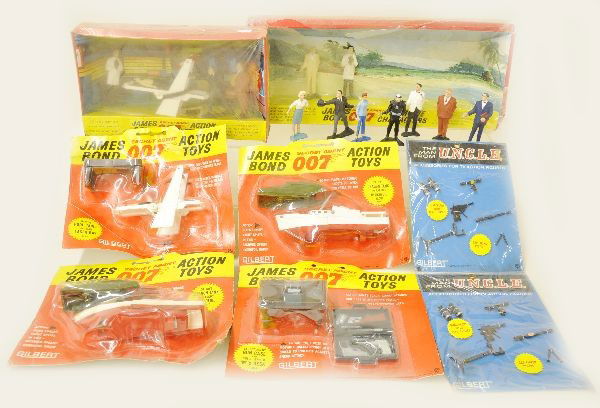 Plastic Vehicle Lot: Marx farm truck, missing top animal; Ideal fix-it Cadillac, 14" long, missing windshield and antenna; 14" battery operated stock truck with tether control. Otherwise, vehicles show light to moderate p