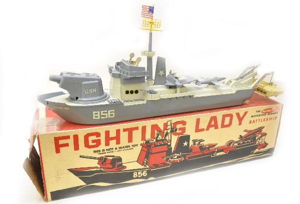 Boxed Remco Battleship: No. 710 Fighting Lady, battery operated plastic boat, 32" long includes bullets, plane, DKW and antenna. Appears to be missing depth charges. Nice original box. Otherwise, shows light to moderate play