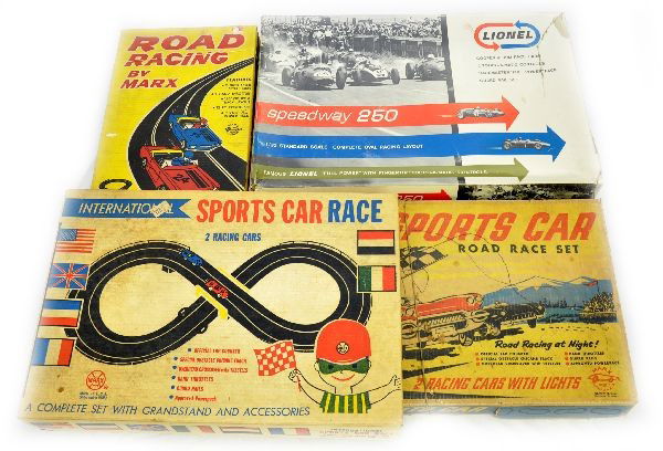 Boxed Slot Car Sets: Marx 22450 International Sports Car Race. Includes 2 Ferraris, no drivers; 22565 Sports Car Road Race Set with Mercedes and Jaguar; 19450 Marx Road Racing includes a Sting Ray and Eldon pick-up, has i