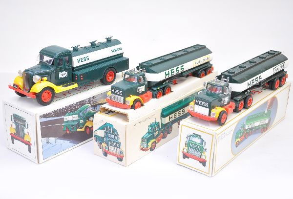Boxed Early Hess Trucks: 1977 tanker with 1 insert; 1983 "First Hess Bank"; 1984 tank truck bank. All show light playwear with nice original boxes, C8