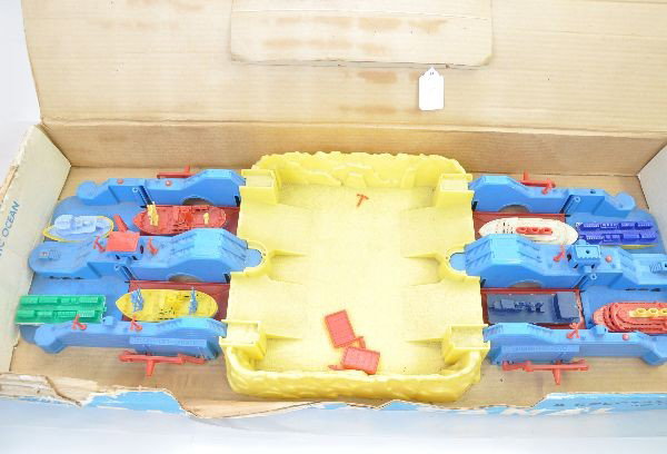 Boxed Renwal 273 Panama Canal: 29" hard plastic toy with 8 ships, missing several small pieces and gates, ob is worn. Otherwise, should clean to C7 or better.