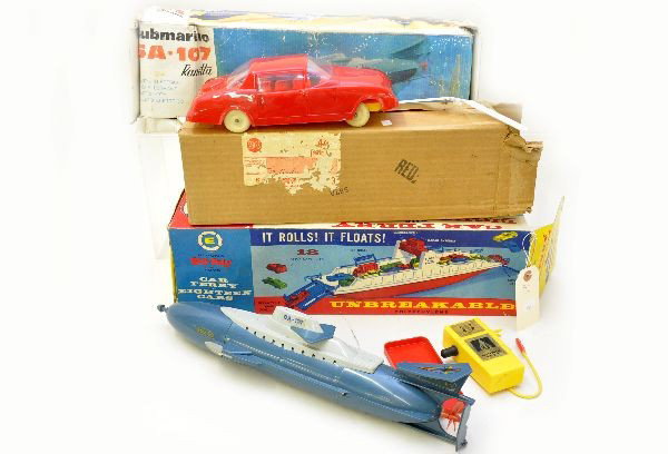 Boxed Vehicle Toys: Eldon 915:300 car ferry 17" long boat with vehicles, appears complete; Ranetta, SA107 submarine, 17" long, battery operated with instructions, worn ob and insert; Tigrett battery operated car with gas
