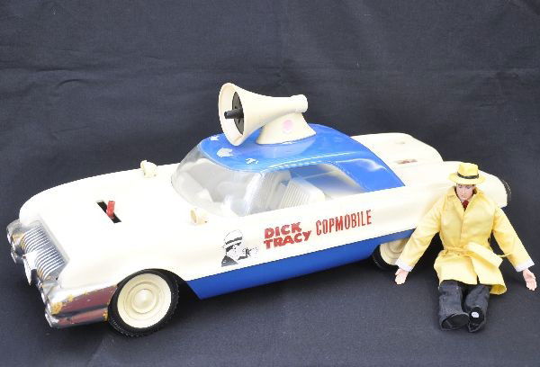 1963 Ideal Dick Tracy Car: 24" model of Tracy's Copmobile. Battery operated, incomplete, some chrome wear. Includes a contemporary Dick Tracy figure. Shows moderate playwear, C6 for condition/operational report, please call or