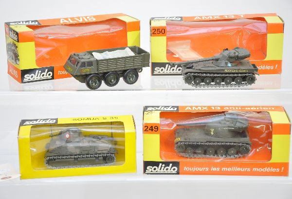 Boxed Solido Military Lot: 247 Alvis, some hub melting; 249 AMX13 tank; 250 AMX13T tank; 234 Somua S35 tank. Otherwise, pieces are near-mint and have clean ob's with minor cellophane wear, C9