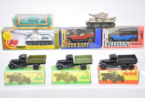 Boxed Russian Vehicles Plus: 3 open wagons, 2 old fashioned cars, Moskvitch. Plus, boxed Corgi 905 SU100 Russian tank destroyer. All appear unused with ob's C9. Loose Corgi Tiger One tank C6