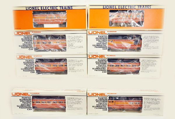 Boxed Lionel SP Passenger Cars: SP Daylight colors. Includes 9590 combo car, 9589 baggage car, 9593 observation, 9592 coach, 9591 coach, 7204 dining car, 7211 vista dome, 19107 vista dome. All are unrun with original boxes and inser