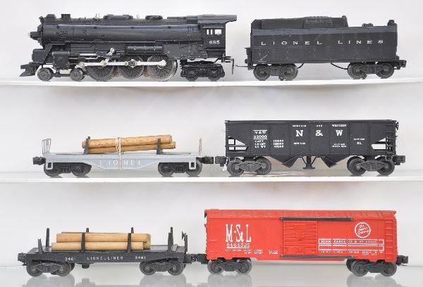 Lionel Steam Freight Set: 685 loco, 6026W tender, 6111 flat with lumber, 3456 N&W operating hopper, 3461 lumber dump, 6464-525 M&StL boxcar, Type IIB body. All show light to moderate playwear, C7-