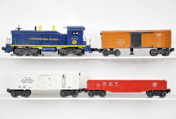 Lionel Diesel Freight Set: 624 C&O NW-2 diesel, decals 95% one side, 10% the other; 3464 NYC operating boxcar with instructions; 3472 milk car, car only, cans inside, missing door springs; 6562 gondola, missing canisters. Other