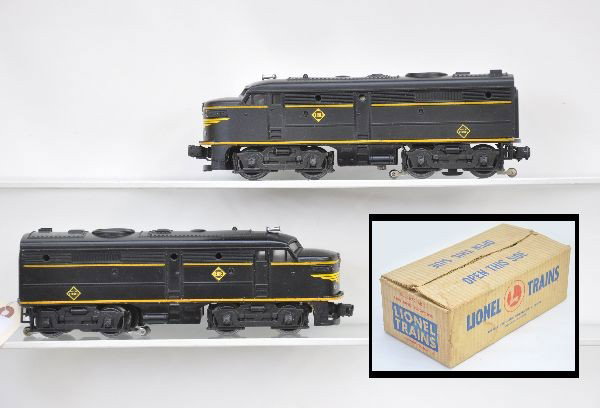 Boxed Lionel 2032 Erie Diesels: Nice set of AA Alcos, overall decals are 95% with both nose decals having minor loss, nice matching set with clean battery box. Lightly stained original master carton with two inserts and instructions