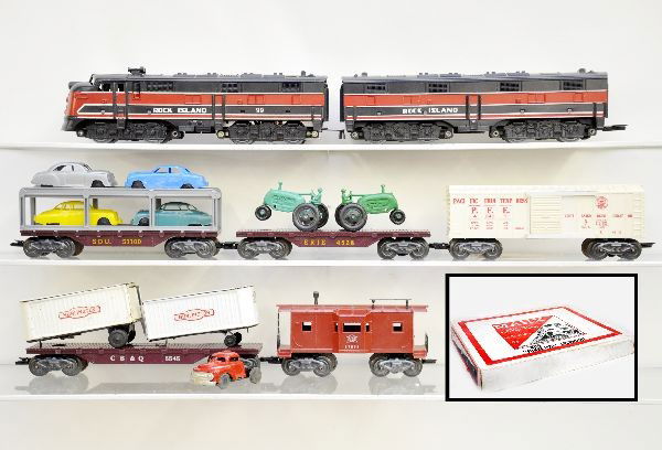 Scarce Boxed Marx Display Set 44835: Includes 99 RI E8 AB diesel, SOU auto loader, rare Erie flat with moss green tractors (reputed to be unique to this set), CB&Q flat with Burlington trailers (missing 2 small wheels, one trailer is C6)