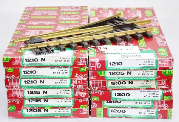 Boxed LGB G-Gauge Switches: 2 #1210, 2 #1210N, 3 #1200, 1200N, 2 #1205N, 2 #1215N. All appear unused but tarnished with original boxes.