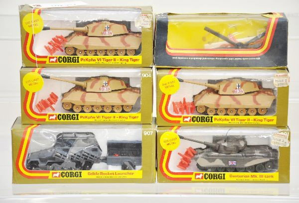 Boxed Corgi Military Vehicles: 901 Centurion tank, 3 #904 King Tiger tanks, 907 German rocket launcher, 922 Sikorsky Skycrane casualty copter. Tanks have ammunition, all have original ob's and display inserts, C9