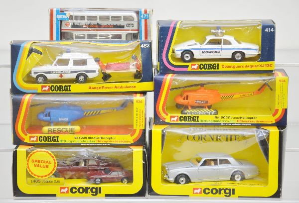 Boxed Corgi Vehicles: 1405 Jaguar XJS two-pack, 1482 Range Rover ambulance, 2 different 924 Bell Rescue Helicopters, 414 Coastguard Jaguar, 279 Rolls Royce, 471 Jubilee bus. All have original boxes with display inserts, C9