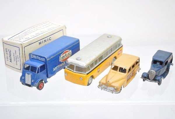 Vehicle Lot: Teckno PTT bus, Dinky Guy Eveready truck, Minic transport van, rough empty Minic police car box, Dinky 27F estate car. All show moderate to heavy playwear, C5-6