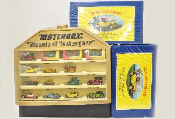Matchbox Models of Yesteryear Displays: This lot includes 2 vinyl MOY display cases and a large store display case with metal storage unit attached. Includes 15 assorted vehicles of various years and conditions, plastic gold cover shows som