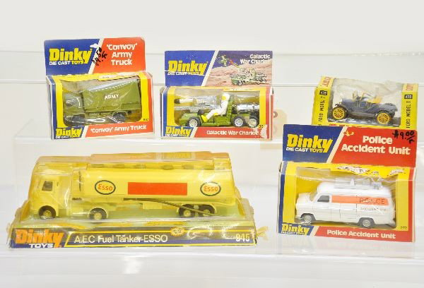 Dinky Vehicle Lot: 475 Model T Ford, 945 AEC Esso fuel truck, ob top yellowed and worn; 687 Army truck; 272 police accident unit; 361 Galactic war chariot. Toys appear unused, original boxes show some wear, Toys are C9