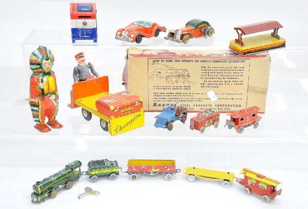 Vintage Tin Toy Lot: Champion baggage truck, Germany, mechanism functional missing luggage; Lindstrom Indian, mechanism functional; 4" German wind-up coupe, functional with key; Japanese friction MG; tin US mail box with