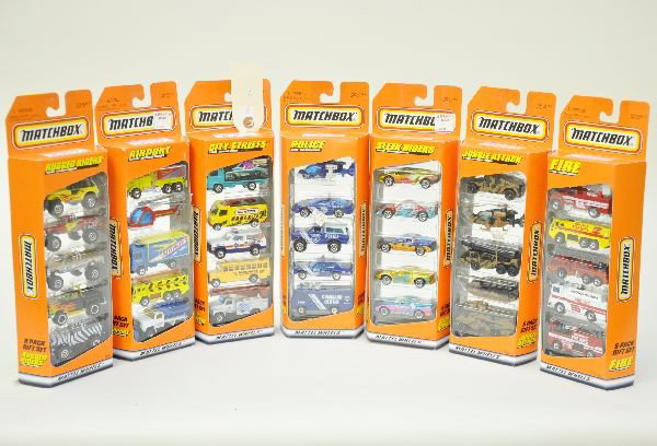 7 Matchbox Five Packs: 1997 series. Includes Police, Sleek Riders, City Streets, Airport, Rugged Riders, Fire, and Jungle Attack. All are factory new, C10