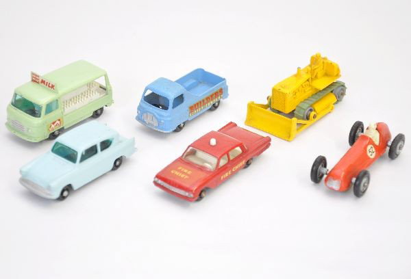 6 Matchbox Vehicles: All black plastic wheels. Includes #59 Fairlane, #52 Maserati, #7 Ford, #60 Morris, #18 dozer, #21 milk float. All show light playwear with minor axle oxi. Should clean to C7+-8