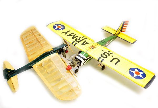 Two Gas Powered Airplanes: One is US Army model plane set up for RC, 49" wingspan, nicely finished and shows light to moderate signs of use. Plus a tether controlled monoplane, 41" wingspan, skin has several tears.
