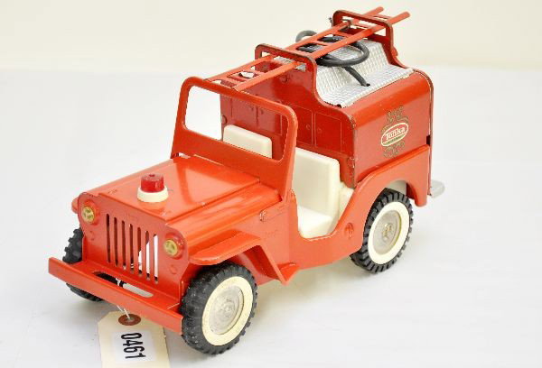 Tonka Fire Jeep: Circa 1965, painted pressed steel, 11" long with rubber tires, original ladder and hose. Jeep section appears to be restored. Top shows light to moderate wear.