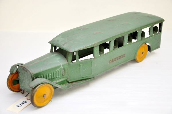 Keystone Inter-City Bus: Painted pressed steel, 24" long, original decals, fairly clean, missing rear panel and headlights. Otherwise, shows moderate playwear C6-