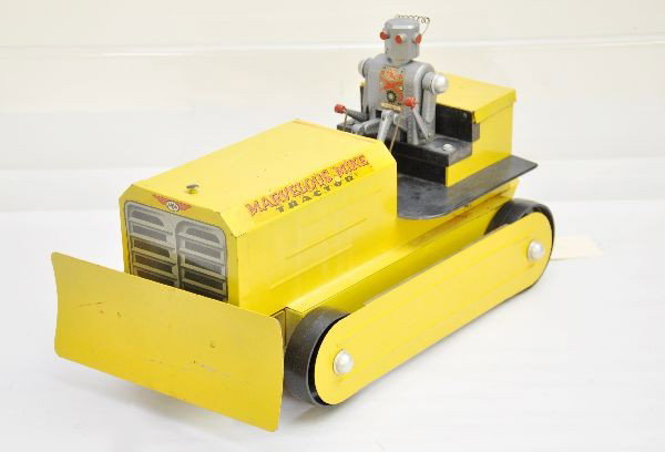 Boxed Saunders Marvelous Mike Tractor: Unusually nice condition with complete, original robot, painted and decaled pressed steel and plastic, 13" long, battery operated, some corrosion inside but displays nicely nonetheless. Original suppl