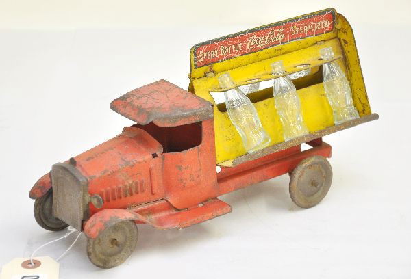 Metal Craft Coca-Cola Truck: 10" long, painted pressed steel with glass bottles, includes 6 of the original 10 bottles, Coke sign is nice though truck shows moderate to heavy playwear, C5