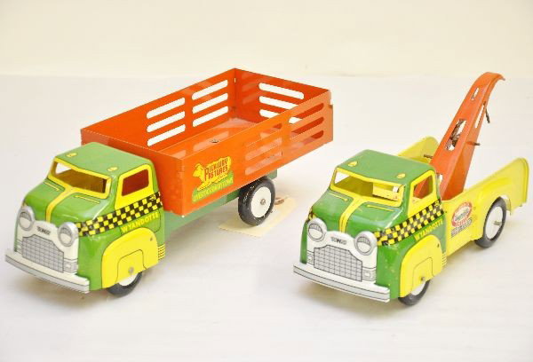2 Nice Wyandotte Trucks: Both are litho and decaled pressed steel. Includes a 12" Pickway Pastures farm truck and a tow truck with original hook and line. Both are clean and shiny, tow truck decals are 90%, farm truck 100% an