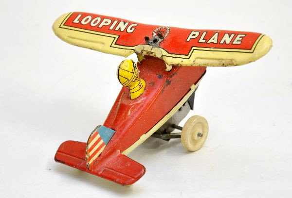 Nice Marx Looping Plane: Circa 1930's, litho tin with wooden wheels, 7 1/2" wingspan, mechanism functional with rollover action, bright clean litho, showing light to moderate playwear, C7