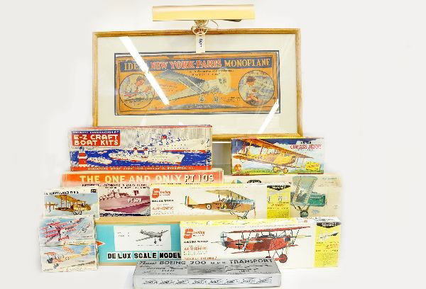 Boat & Airplane Model Kit Lot Plus: Nice glass framed box top of Ideal Spirit of 76 model plane, illuminated, measures 31" x 17"; Dumas wood PT 109 kit; MBS harbor patrol boat kit; plus 9 airplane kits, wood and plastic by Eureka, Sterl