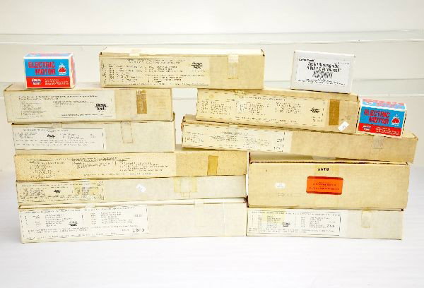 Boxed Model Kit Motors & Accessories: Several are Dumas, running hardware kits, several prop shaft, stuffing, box and prop kits, a few Mack products marine running hardware and power kits, bag of new Dremel tools. All appear unused. Exami