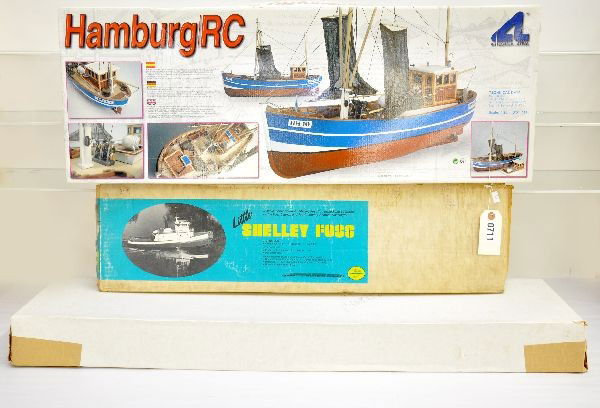 3 Boxed Wooden Model Boat Kits: Artesania Hamburg RC Fishing Boat, 1:20 scale; Dumas 1206 Little Shelley Foss Tug Boat; Dumas 1939 Brooklyn Tug Boat, box measures 33". All have original boxes, are unbuilt and appear complete but are