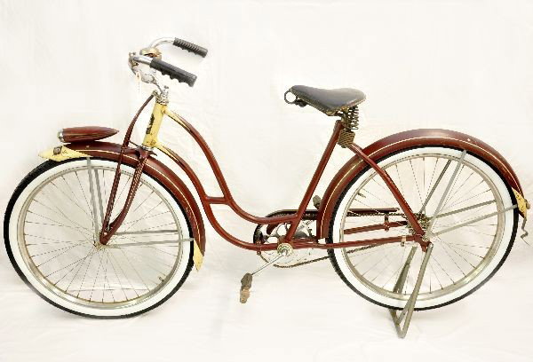 Vintage Fleetwood Girls Bicycle: Nice 1950's styling. 19" frame with 26" tires. Nice original bicycle. Includes front fender panel for owner's initials, headlight, bell working with some rust, one rubber handgrip is cracked, leather 