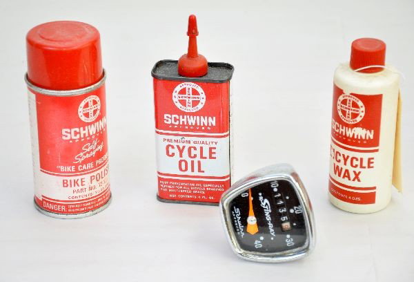 Scarce Schwinn Bicycle Accessories: Includes 4 oz. Bicycle wax, 4 oz. Cycle oil empty, 73-201 bicycle polish and Sting-Ray speedometer odometer with light pitting to chrome.