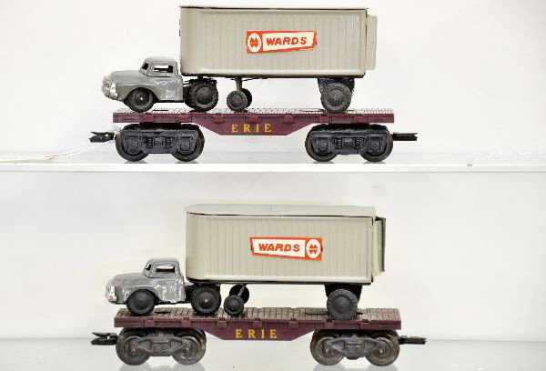 Scarce Montgomery Ward Tractor Trailers: Includes 2 flats with Ward's tractors and trailers. Both are different versions, both have different original boxes. Both show light playwear, C8