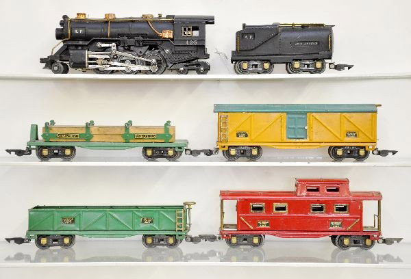 Pre-War American Flyer Steam Freight Set: #425, 2-6-4 steam loco with ob and 426 Vanderbilt tender with ob, 407 sand car, 408 boxcar with ob, 406 log car ob, 411 illuminated caboose with ob. Nice matched set, all couplers intact, shows light 