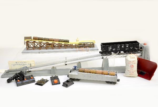 Lionel 456 & 362 Accessories Plus: 456 coal ramp set including 3456 N&W operating hopper and accessories; 362 barrel loader, complete. Plus 3562-25 barrel car with controller and activator. All show light to moderate playwear, C7