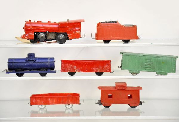 Prototype Marx Guid-a-traffic Set: Loco tag reads Model No.1897 "guid-a-traffic" locomotive, 8-11-52, includes tender and 5 freight cars, all with prototype markings underneath.