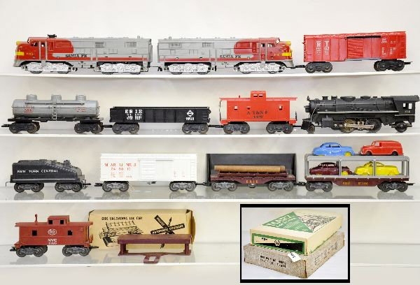 Boxed Marx Sets 52295 & 44874: 52295 includes 666 cast steam loco, tender, auto loader, boxed 5594AS log unloader, operating reefer with platform, caboose, track, transformer. Set 44874 includes 1095 SF E8 AA diesels, gondola, tank
